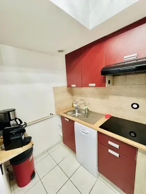 Cuisine ou kitchenette dans l'établissement Kap'Lor