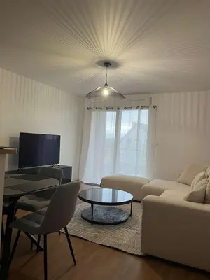 Télévision ou salle de divertissement dans l'établissement Appartement chaleureux proche du centre et de la plage