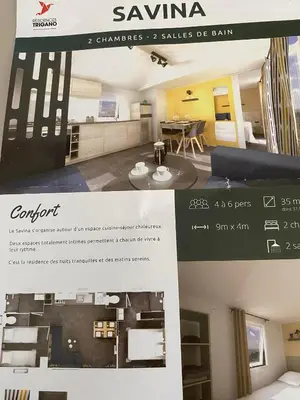Cuisine ou kitchenette dans l'établissement mobil home 742