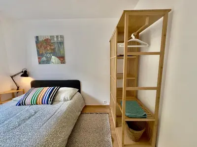 Un ou plusieurs lits dans un hébergement de l'établissement Appartement central proche Base Navale et Siam