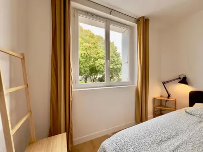 Un ou plusieurs lits dans un hébergement de l'établissement Appartement central proche Base Navale et Siam