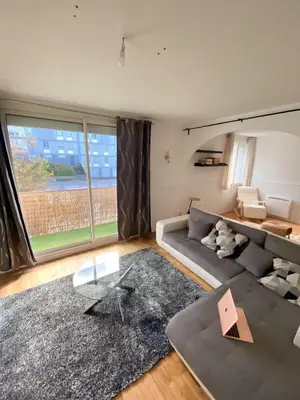 Coin salon dans l'établissement Appartement proche centre-ville