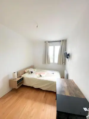 Un ou plusieurs lits dans un hébergement de l'établissement Appartement proche centre-ville