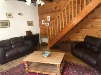 Coin salon dans l'établissement Farmyard at Kerespars, 3 Houses, Sleeps 30 with pool