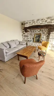 Coin salon dans l'établissement La Parenthèse Enchantée