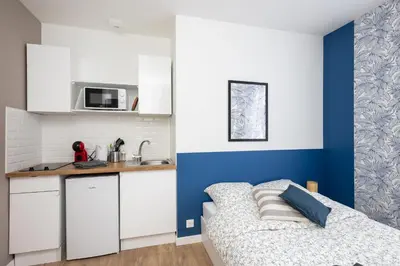 Cuisine ou kitchenette dans l'établissement Ma Doue