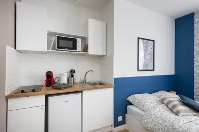 Cuisine ou kitchenette dans l'établissement Ma Doue