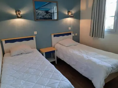 Un ou plusieurs lits dans un hébergement de l'établissement A07- Apt PMR 4 à 5 pers, sea view, beach, pool