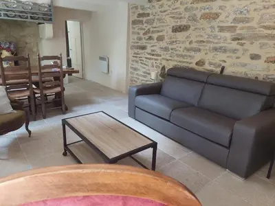 Coin salon dans l'établissement Adorable Chaumière traditionnelle plage à pied