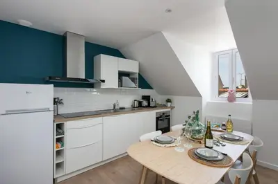 Cuisine ou kitchenette dans l'établissement Appartement Le Cap Morgat