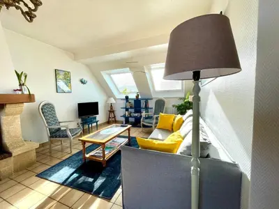 Télévision ou salle de divertissement dans l'établissement Maison de la plage Santec