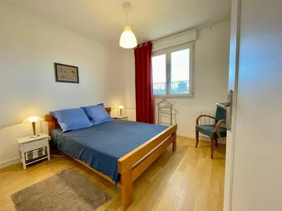 Un ou plusieurs lits dans un hébergement de l'établissement Maison de la plage Santec