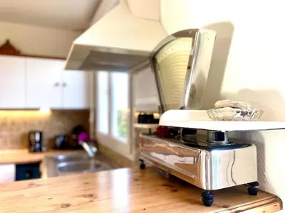 Cuisine ou kitchenette dans l'établissement Maison de la plage Santec