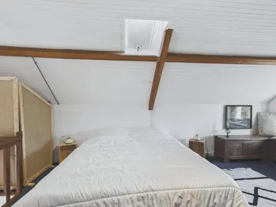Un ou plusieurs lits dans un hébergement de l'établissement Vue mer - Maison avec jardin pour 2