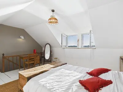 Un ou plusieurs lits dans un hébergement de l'établissement Maison vue mer pour 2 à Plouguerneau