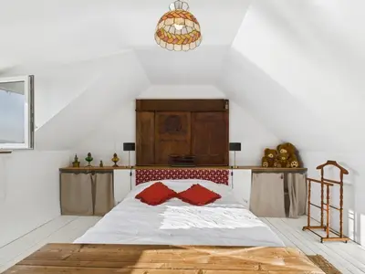 Un ou plusieurs lits dans un hébergement de l'établissement Maison vue mer pour 2 à Plouguerneau
