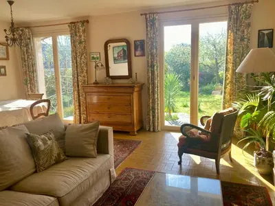 Coin salon dans l'établissement Maison aux camélias