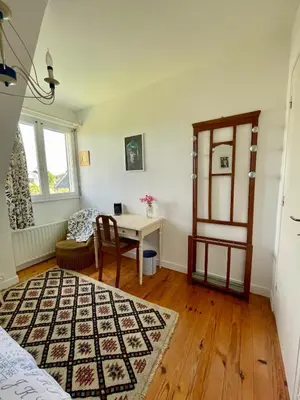 Un ou plusieurs lits dans un hébergement de l'établissement Maison aux camélias