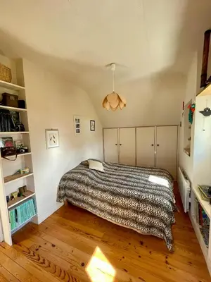 Un ou plusieurs lits dans un hébergement de l'établissement Maison aux camélias