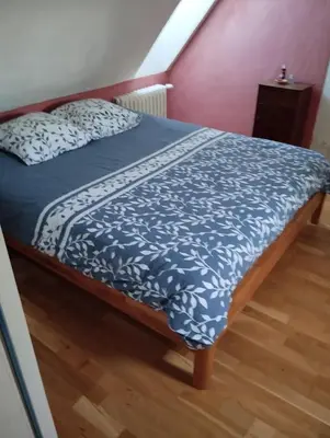 Un ou plusieurs lits dans un hébergement de l'établissement Maison du manoir
