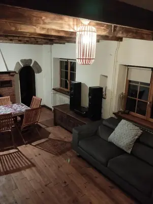 Coin salon dans l'établissement Maison du manoir