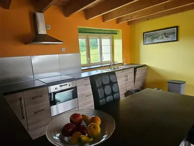 Cuisine ou kitchenette dans l'établissement Maison ancienne