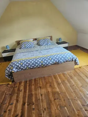 Un ou plusieurs lits dans un hébergement de l'établissement Maison ancienne