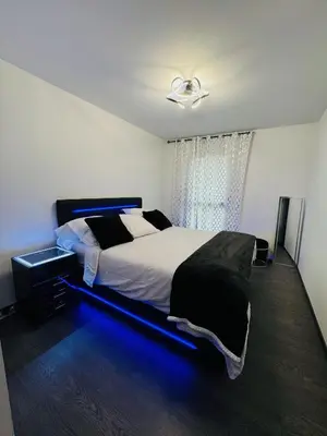 Un ou plusieurs lits dans un hébergement de l'établissement Chambres Carantec
