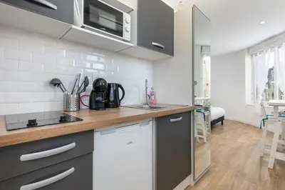 Cuisine ou kitchenette dans l'établissement Notre Dame de Rumengol