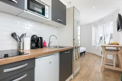 Cuisine ou kitchenette dans l'établissement Marie-claudine