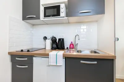Cuisine ou kitchenette dans l'établissement Marie-claudine
