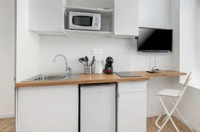 Cuisine ou kitchenette dans l'établissement Paimpont