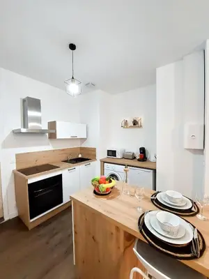 Cuisine ou kitchenette dans l'établissement T2 centre-ville - gare