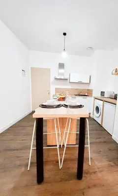 Cuisine ou kitchenette dans l'établissement T2 centre-ville - gare