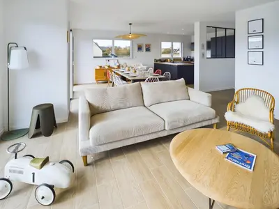 Coin salon dans l'établissement Maison avec jardin pour 10 personnes à Penmarch