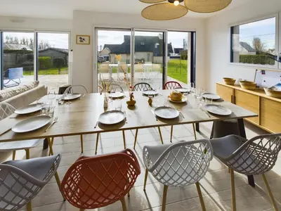 Coin salon dans l'établissement Maison avec jardin pour 10 personnes à Penmarch