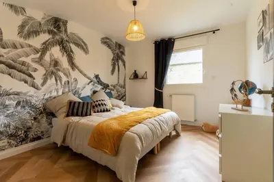Un ou plusieurs lits dans un hébergement de l'établissement Villa Ty Amor - avec grand jardin et jacuzzi pour 9