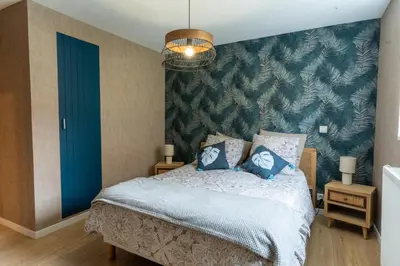 Un ou plusieurs lits dans un hébergement de l'établissement Villa Ty Amor - avec grand jardin et jacuzzi pour 9