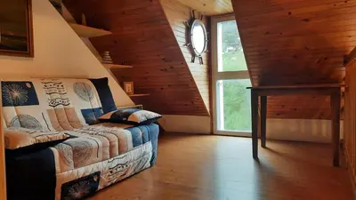 Coin salon dans l'établissement Jolie maison vue mer 6 personnes à Plouguerneau