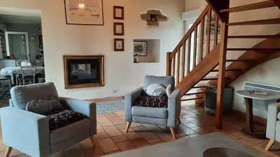 Coin salon dans l'établissement Jolie maison vue mer 6 personnes à Plouguerneau
