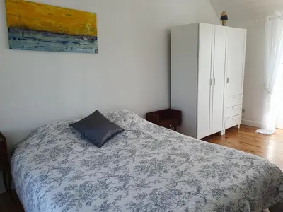 Un ou plusieurs lits dans un hébergement de l'établissement Jolie maison vue mer 6 personnes à Plouguerneau