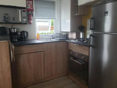 Cuisine ou kitchenette dans l'établissement Mobil-home 3 chambres Pont-Aven