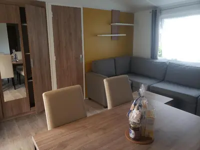 Coin salon dans l'établissement Mobil-home 3 chambres Pont-Aven