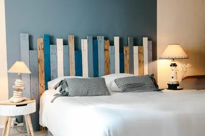 Un ou plusieurs lits dans un hébergement de l'établissement Terrasse vue mer pour 2 personnes, Plouguerneau