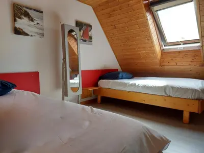 Un ou plusieurs lits dans un hébergement de l'établissement Face à la mer, maison sur la dune pour 4 personnes