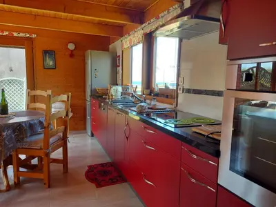 Cuisine ou kitchenette dans l'établissement Face à la mer, maison sur la dune pour 4 personnes