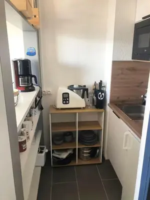 Cuisine ou kitchenette dans l'établissement Charmant duplex avec belle vue mer la plage à 100 m