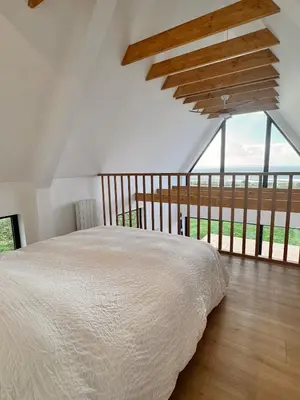 Un ou plusieurs lits dans un hébergement de l'établissement Maisonette vue mer 500m de la plage