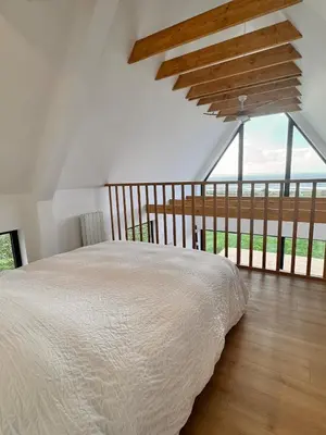 Un ou plusieurs lits dans un hébergement de l'établissement Maisonette vue mer 500m de la plage