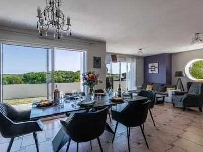 Coin salon dans l'établissement DUXCAAR Saint Pabu Comfortable holiday residence